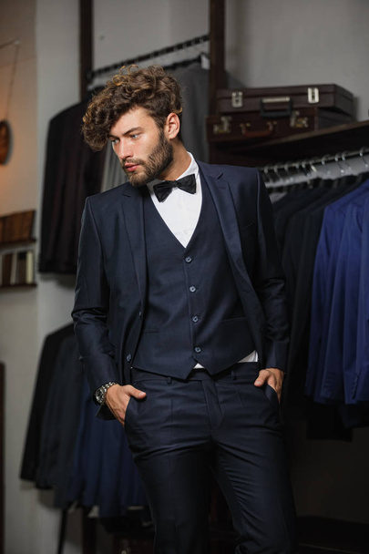 Extravagant stylish man in tailor studio. Perfect to the last detail. - Foto, Imagem