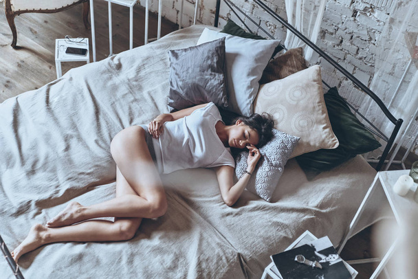 woman sleeping in bed - Photo, Image