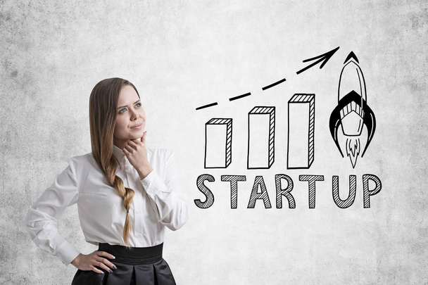 Businesswoman with a braid and startup graph - Foto, immagini