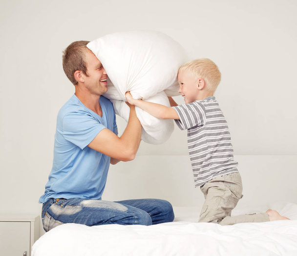 pillow fight at home - 写真・画像