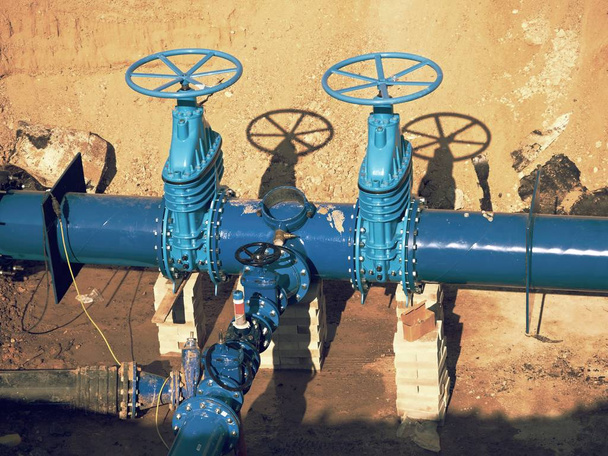 500 мм питної води Засувка з'єднання з прикрученою трубопровідною арматурою - ремонт магістрального водопроводу
 - Фото, зображення