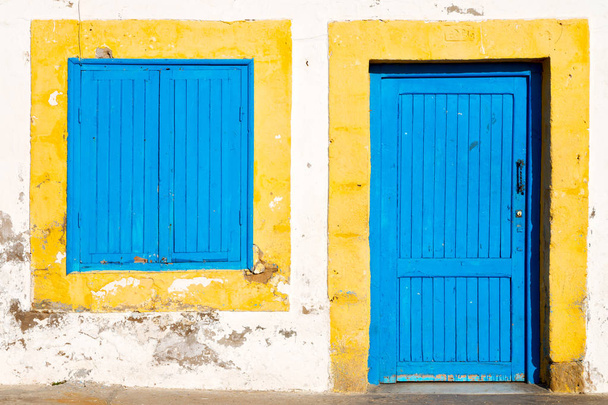 old door in morocco africa ancien and wall ornate blue yellow - Photo, Image