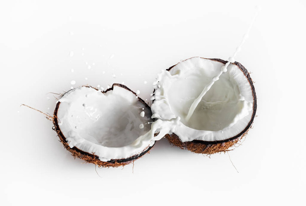 Coconuts with milk splash - Foto, imagen