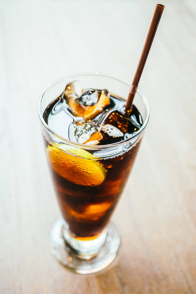 Iced cola drink in glass - Фото, зображення