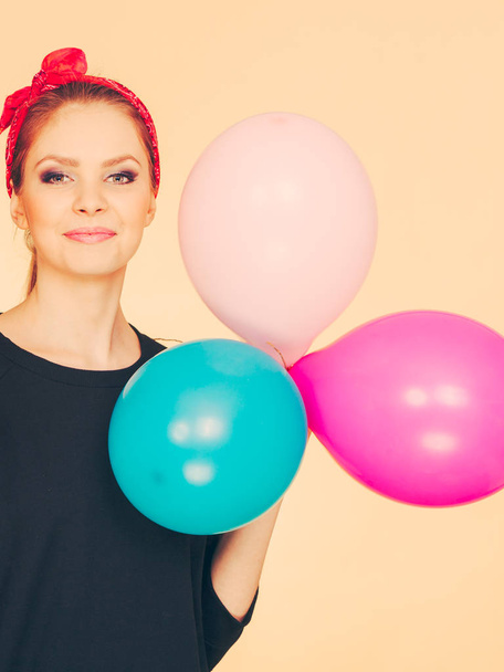 Happy smiling woman with balloons. - Foto, afbeelding