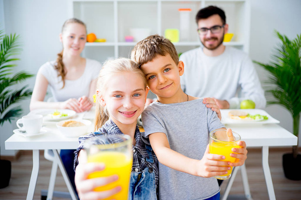 Family having breakfast - Фото, изображение