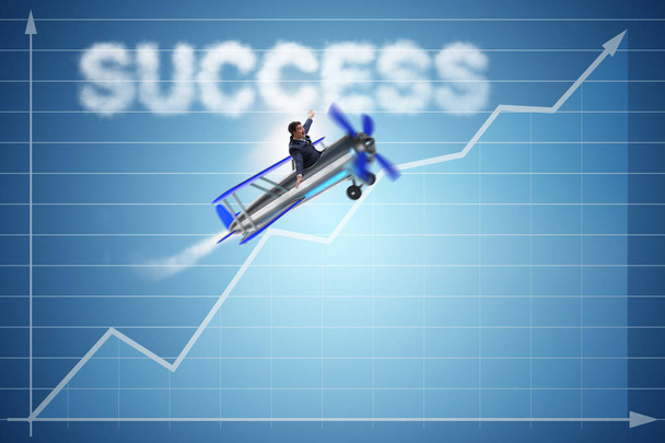 Επιχειρηματίας που πετούν με αεροπλάνο στην έννοια της επιτυχίας - Φωτογραφία, εικόνα