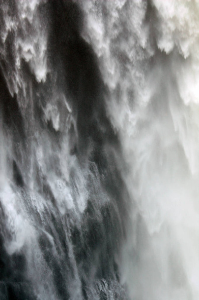 Water flow of the Victoria falls on the background - Photo, Image