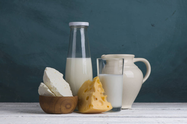 Protein products: cheese, cream, milk, eggs. On a white background. - Foto, Imagen