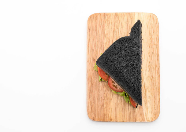 tuna charcoal  sandwich - Фото, изображение