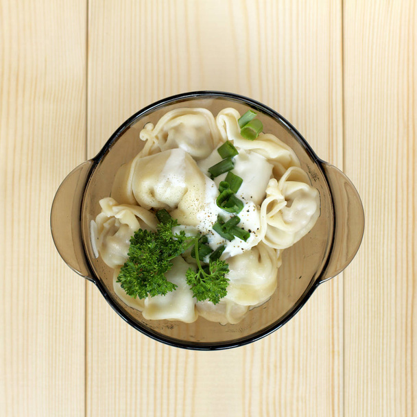delicious dumplings with sour cream - Foto, Imagem