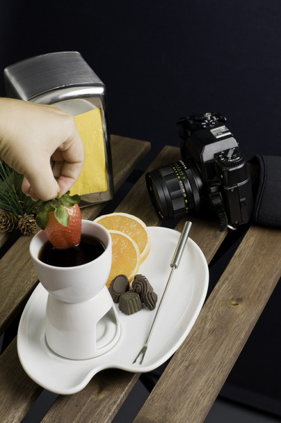 Dipping strawberry to hot fondue - Photo, Image
