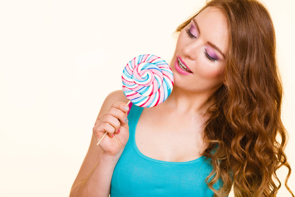 Woman joyful girl with lollipop candy - Foto, Imagen