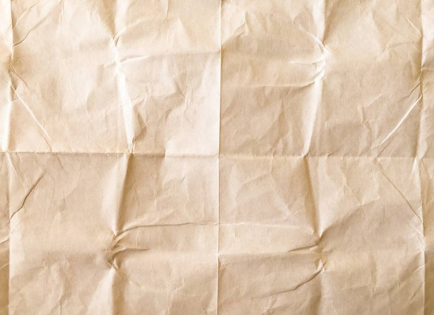 White sheet of paper folded. Crushed and folded white sheet of paper. Note paper. Wrinkled paper - Photo, Image
