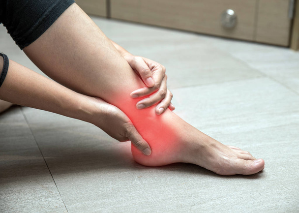 Female leg and muscle pain from illness or accident, sport physical injuries when working out. Painful leg and ankle, foot in pain, physical injury. - Photo, Image