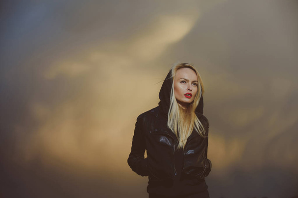 woman with red lips in leather jacket - Fotografie, Obrázek