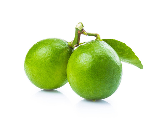 two fresh green limes on white background - Photo, Image