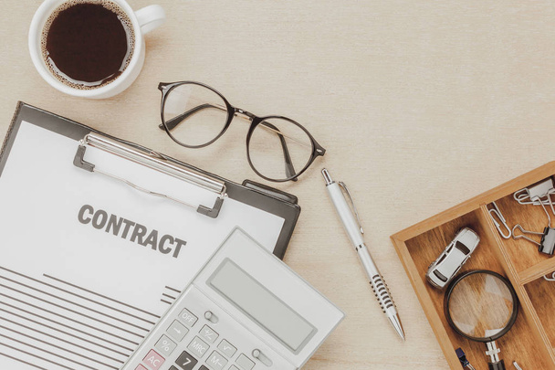 Top view business contract form with coffee eyeglasses. - Foto, Imagen
