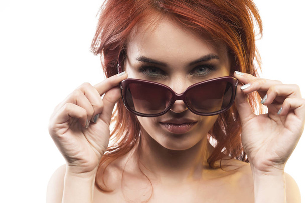 the redhead girl in sunglasses type 9 - Фото, изображение