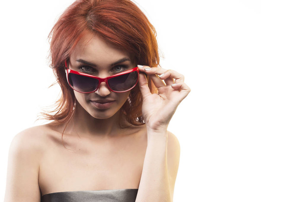 the redhead girl in sunglasses type 14 - Фото, изображение