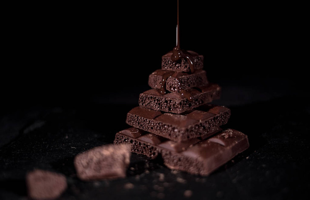 Stack of black pore chocolate  - Photo, Image