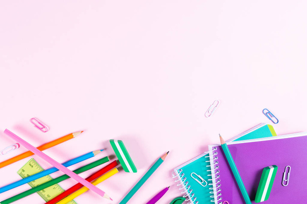 School stationery on pink background with copyspace - Photo, Image