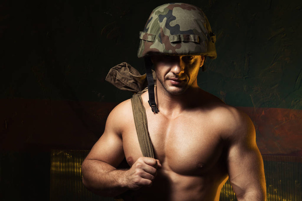 Muscular man come back from army - Zdjęcie, obraz