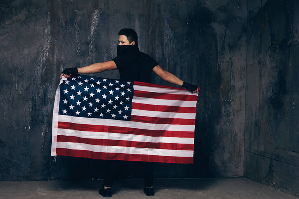 USA flag and unrecognizable man in band - Foto, Imagem