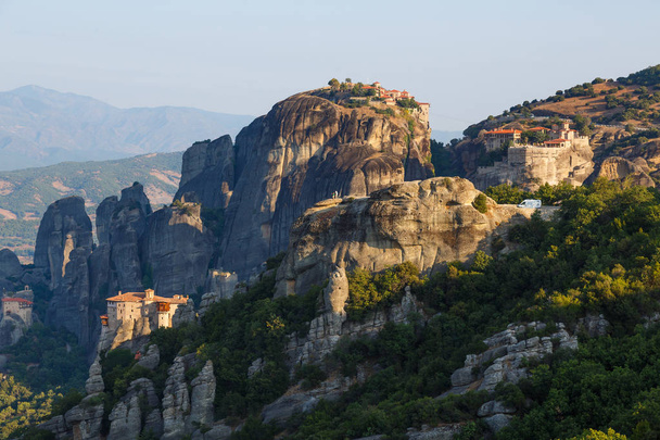 Greece. Meteora - incredible sandstone rock formations. The Holly Monastery at sunrise - Foto, imagen