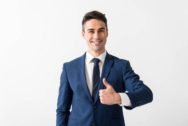 Outgoing man showing symbol cool - Photo, image