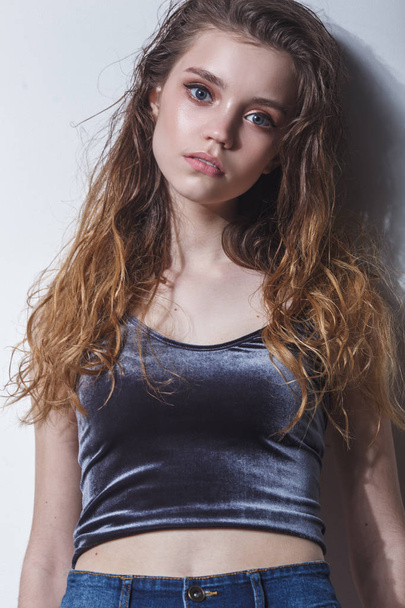 model girl tests portrait over dark background - Fotó, kép