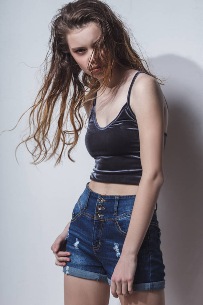 model girl tests portrait over dark background - Fotó, kép