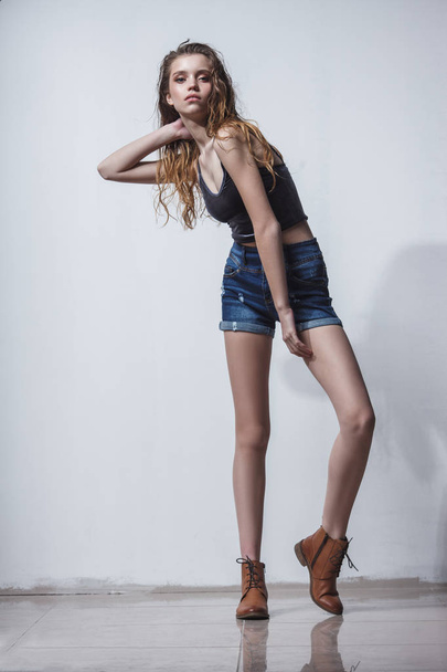 model girl tests portrait over dark background - Photo, Image