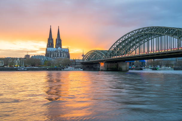 Sunset view of Cologne skyline in Cologne, Germany - Photo, Image