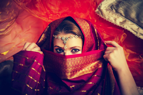 Beautiful pregnant girl in traditional Indian clothes.  - Photo, image