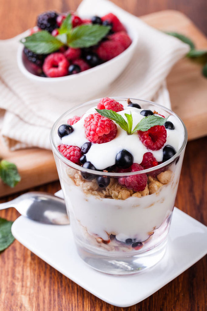 yogurt with muesli and berries - Fotó, kép