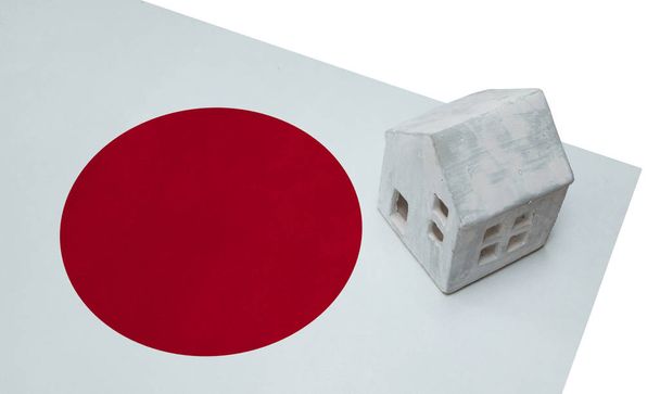 Kleines Haus auf einer Fahne - Japan - Foto, Bild