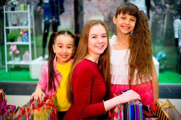 Mother and daughters shopping - Foto, Imagen