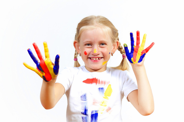 Boldog gyermek kezében festék - Fotó, kép
