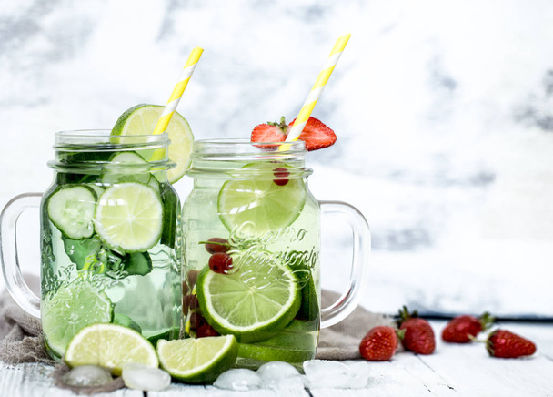 Summer drink with cucumber and lime - Фото, изображение