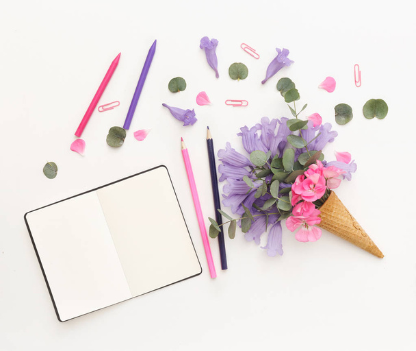Creative still life with notebook and ice cream waffle cone  - Valokuva, kuva