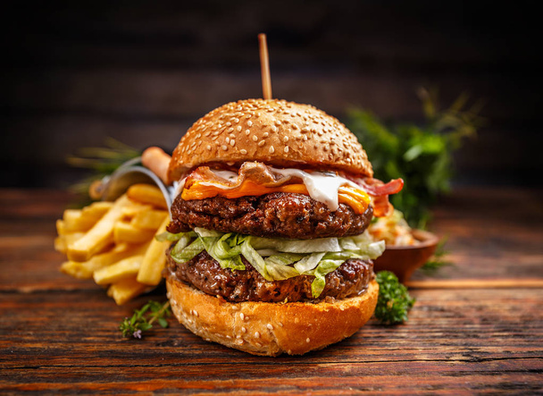 Delicious burgers with beef patty - Fotoğraf, Görsel