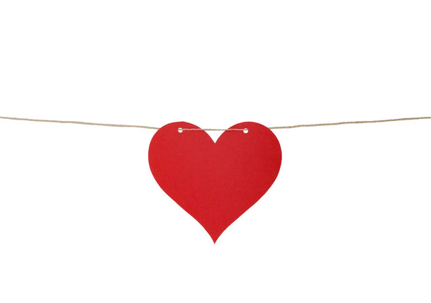 Un cuore di carta su una corda
 - Foto, immagini