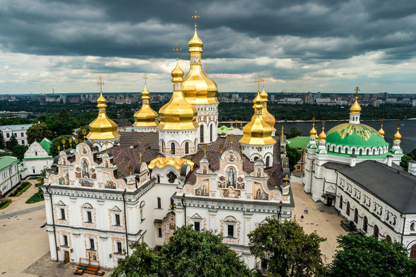 cupolas of Kyiv Pechersk Lavra monastery from bell tower - Fotó, kép