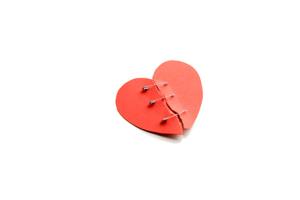 Red heart with broken parts  - Zdjęcie, obraz