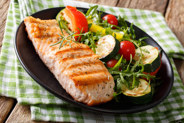 Healthy food: grilled salmon fillets with vegetable salad and ar - Photo, Image