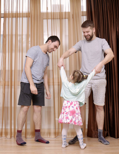 Male gay couple with daughter - Foto, Imagen