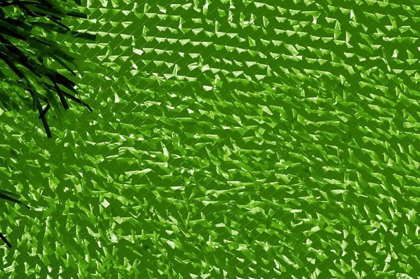 abstracte achtergrond textuur van een raster en weefsel van groene kleur - Foto, afbeelding