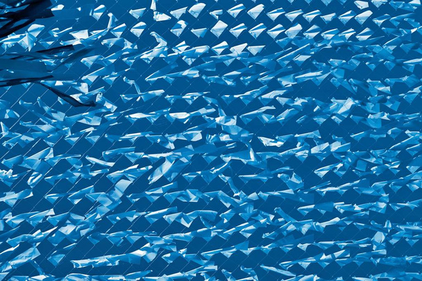 αφηρημένα φόντο υφή από ένα πλέγμα και ύφασμα του μπλε χρώματος - Φωτογραφία, εικόνα