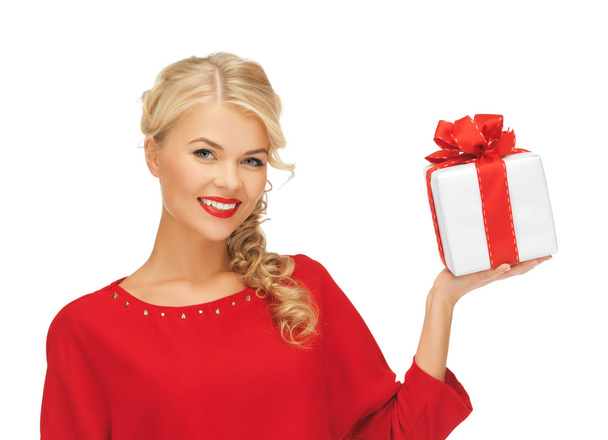 Lovely woman in red dress with present - Fotoğraf, Görsel